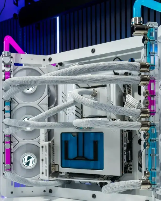 Custom loop PC mod with white sleeved tubing and radiator layout by Wired Hardware