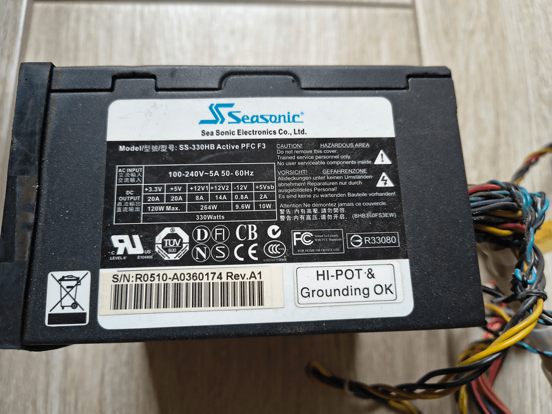 Seasonic S12-330 displayed in a museum-style case